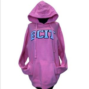 BCIT bright coral pink/orange with embroidered satin logo kangaroo hoodie.